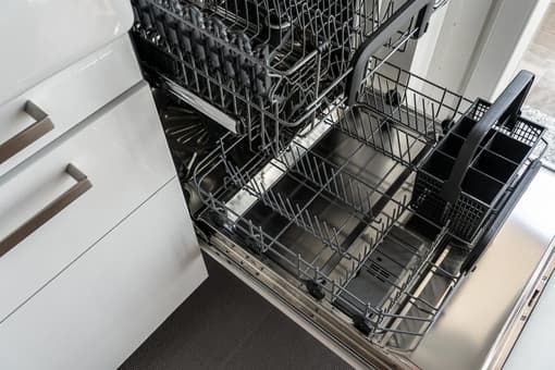 Birds eye view of an empty stainless steel dishwasher